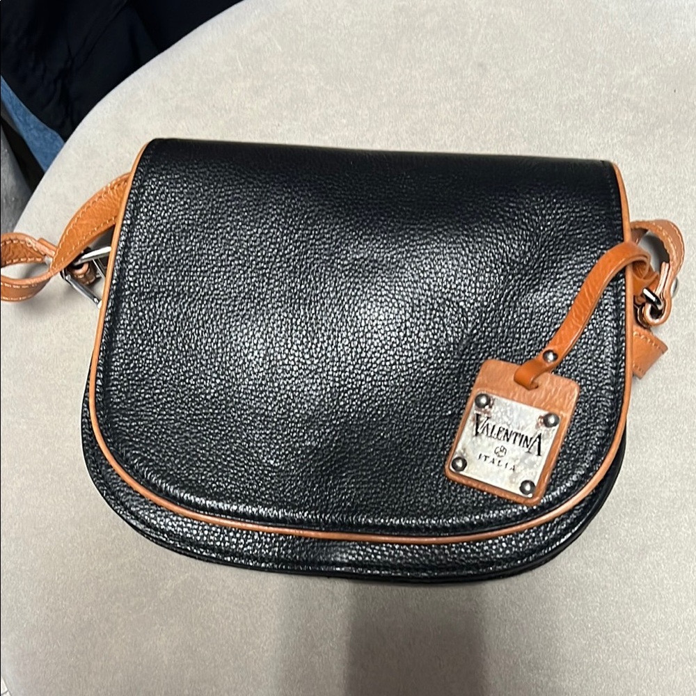 Valentina Black and Tan Crossbody Bag with Saddle Silhouette